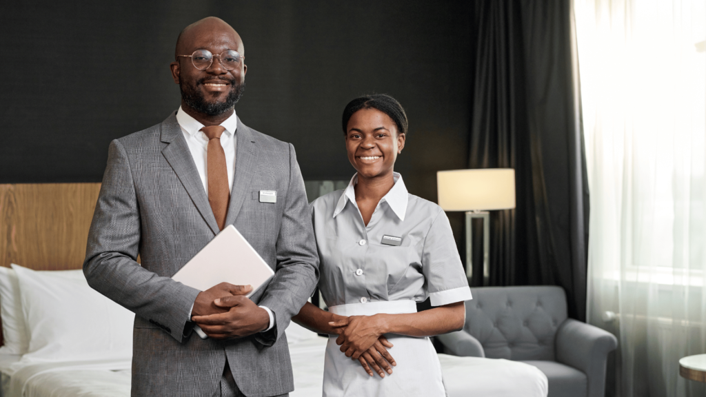 A residential cleaning staff member with a supervisor.